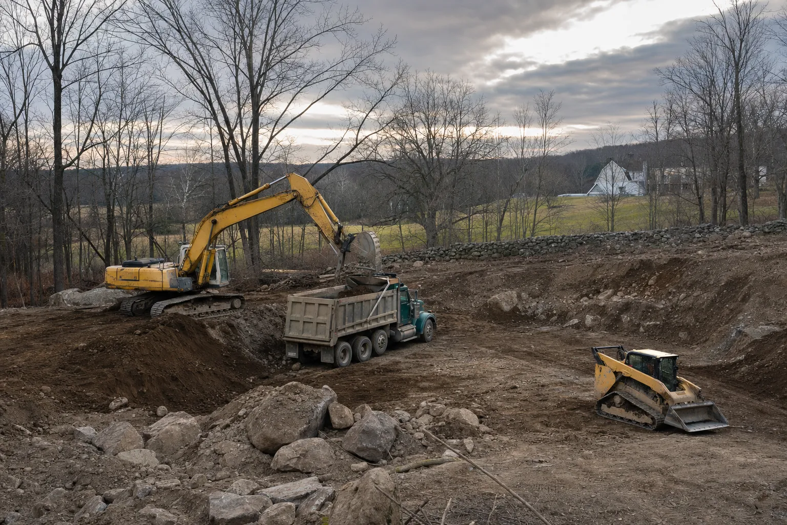 Excavation crew and equipment working on a job site in Brooklyn, Connecticut