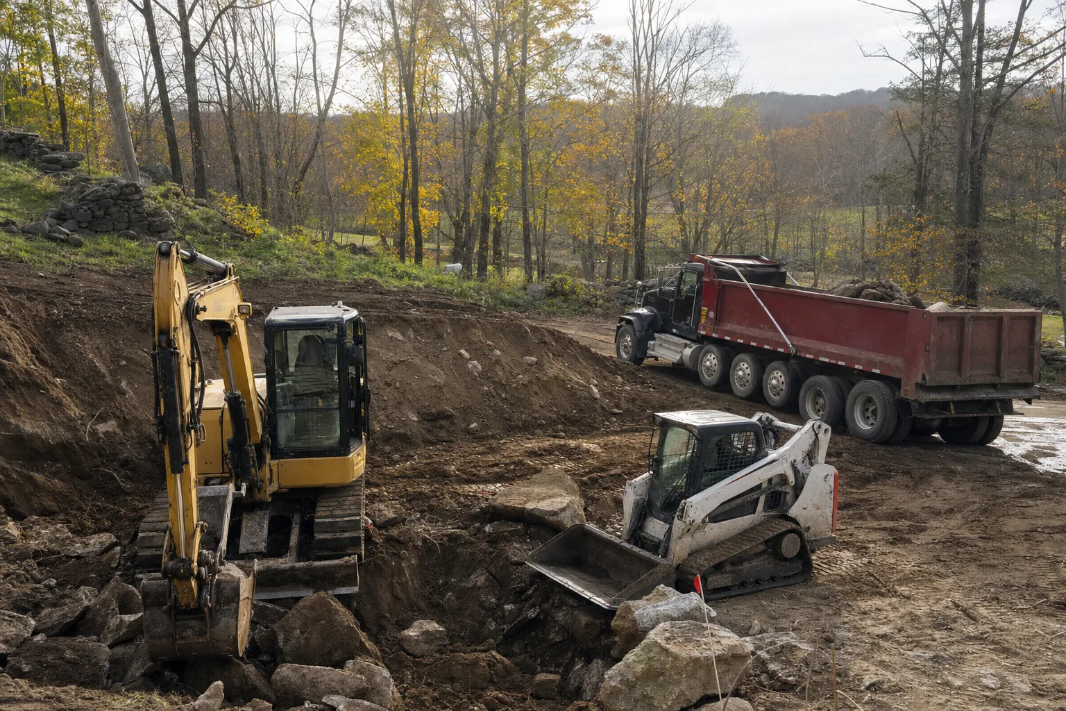 Excavation crew and equipment working on a job site in Norwich, Connecticut