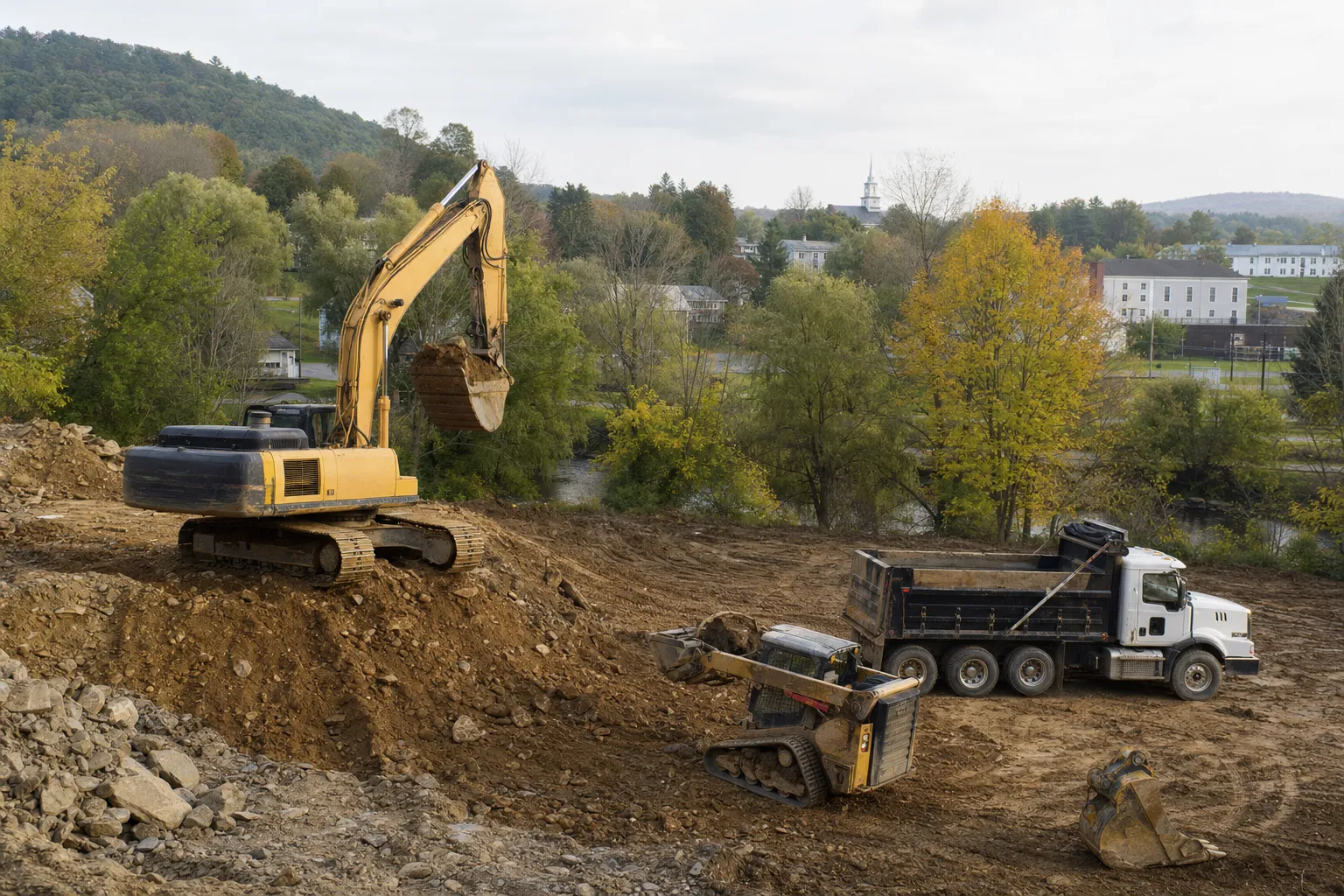 Excavation crew and equipment working on a job site in Plainfield, Connecticut